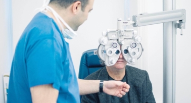 man having eyes checked for laser eye surgery